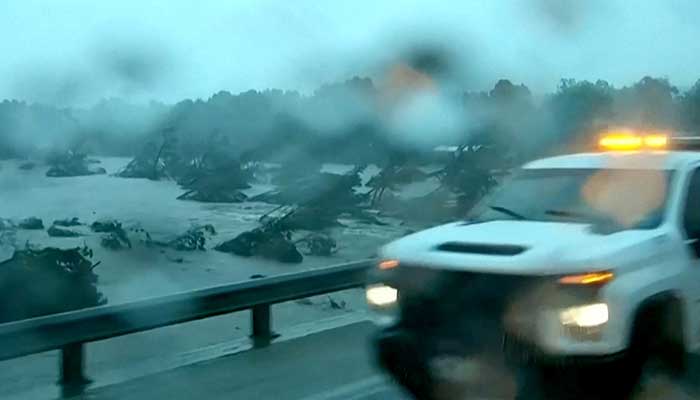 First responders survey rising flood waters of the Guadalupe River after flash flooding in Kerr County, Texas, US, July 4, 2025 in a still image from video. — Reuters