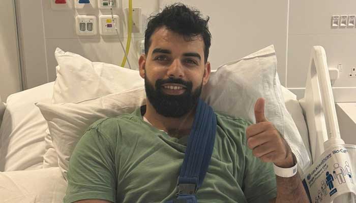 The image shows Shadab Khan after shoulder surgery. — X@76Shadabkhan