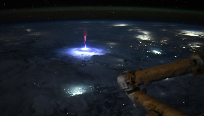 A giant jellyfish-shaped red lightning  sprite can be seen in this image taken on July 3, 2025, from the ISS over parts of Mexico and the southern US. — X/@Astro_Ayers