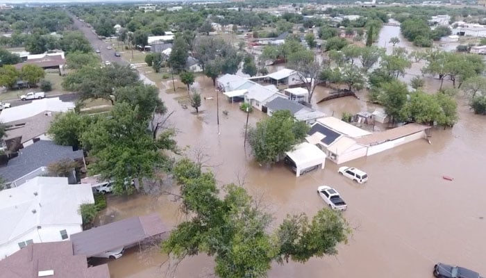A drone view shows flooded houses, following torrential rains that unleashed flash floods along the Guadalupe River in San Angelo, Texas, U.S., June 4, 2025. — Reuters