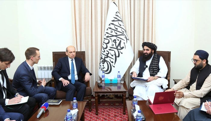 Afghanistans Foreign Minister Amir Khan Muttaqi [second right) meeting with Russia’s Ambassador to Afghanistan Dmitry Zhirnov [third left) at the Foreign Ministry in Kabul. — AFP