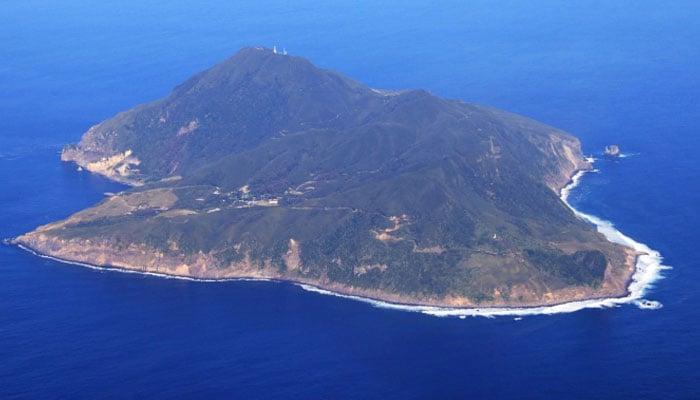 An aerial photo shows Akusekijima which is one of the Tokara Islands in Toshima Village, Kagoshima Prefecture, western Japan and Kyusyu region, on Dec. 11, 2021. — AFP