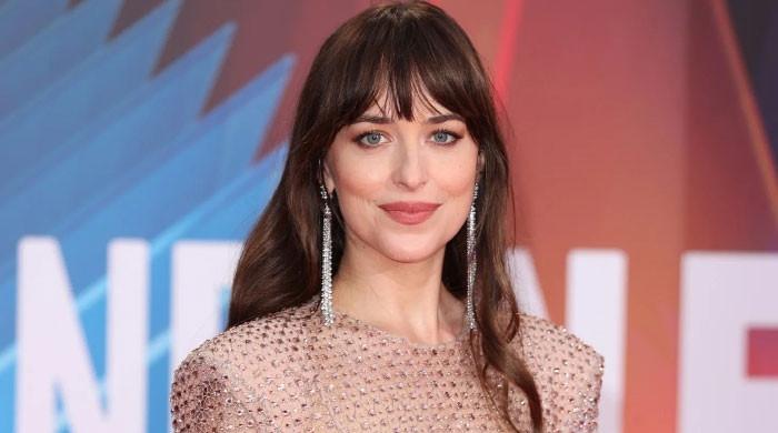 Dakota Johnson discussing her love for romantic comedies