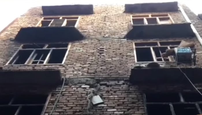 A view of the house that caught fire in Peshawars Kochi Bazaar taken from a video on July 8, 2025. — Reporter