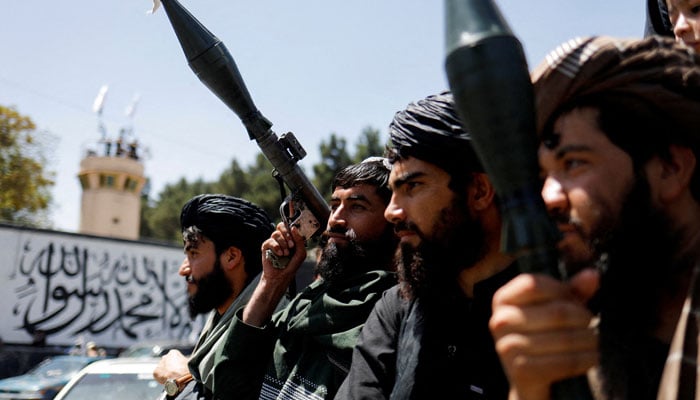 Taliban soldiers celebrate on the second anniversary of the fall of Kabul on a street near the US embassy in Kabul, Afghanistan, August 15, 2023. — Reuters