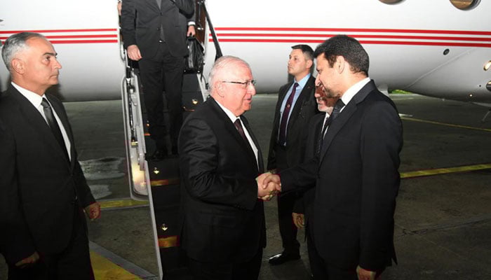 Turkish Defence Minsiter shakes hands with FO officials after landing at Nur KHan Airbase on July 9, 2025. — PID