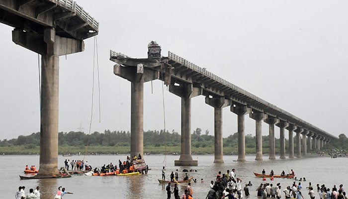 Rescuers search for survivors after a bridge collapsed in Vadodara in the western state of Gujarat, India, July 9, 2025.  — Reuters