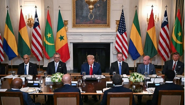 US President Donald Trump (C) speaks during a multilateral lunch with visiting African leaders at the White House on Wednesday. —AFP