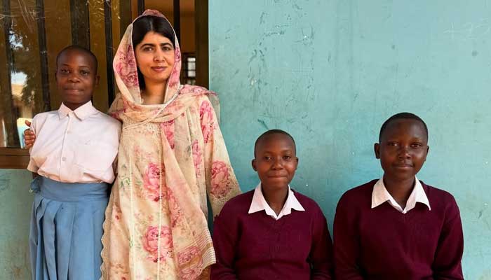 Malala Yousafzai with girls in a school in Tanania. — Instagram@malala