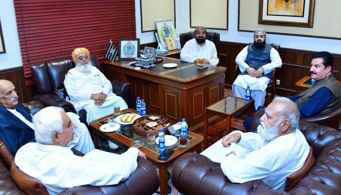 The image shows meeting between a PPP delegation led by KP  Governor Faisal Karim Kundi meeting JUI-F chief Fazlur Rehman at his residence in Islamabad on July 11, 2025. — Facebook@FaisalKarimKundi
