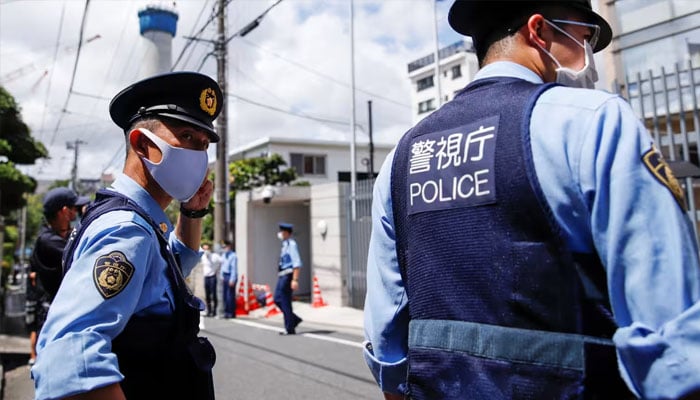 Police officers in Tokyo. — Reuters