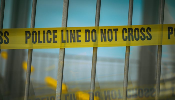 This representational image shows a crime scene tape. — Unsplash