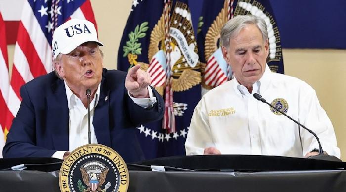 Trump visits Texas flood zone, defends govt’s disaster response
