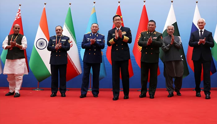 Chinese Defence Minister Dong Jun, Indias Defence Minister Rajnath Singh, Irans Defence Minister Aziz Nasirzadeh, Kazakhstans Defence Minister Dauren Kosanov, Kyrgyzstans Defence Minister Ruslan Mukambetov, Pakistans Defence Minister Khawaja Asif and Russias Defence Minister Andrei Belousov applaud following a group photo, before the Shanghai Cooperation Organisation (SCO) Defence Ministers Meeting in Qingdao, Shandong province, China June 26, 2025. — Reuters