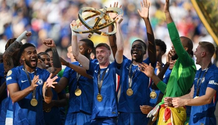 Chelsea midfielder Cole Palmer lifts the trophy with players during the award ceremony for the FIFA Club World Cup 2025 champion in East Rutherford, New Jersey, on Sunday. — AFP