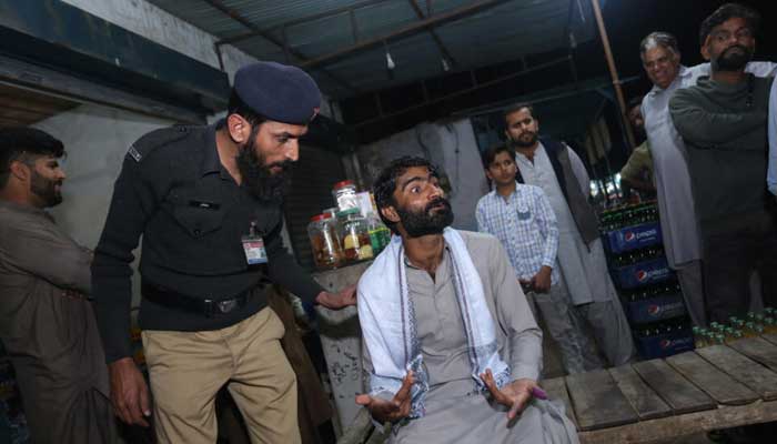 Muhammad Waseem (C), who killed his sister Qandeel Baloch, was released from prison less than three years into what was meant to be a life sentence. — AFP/File