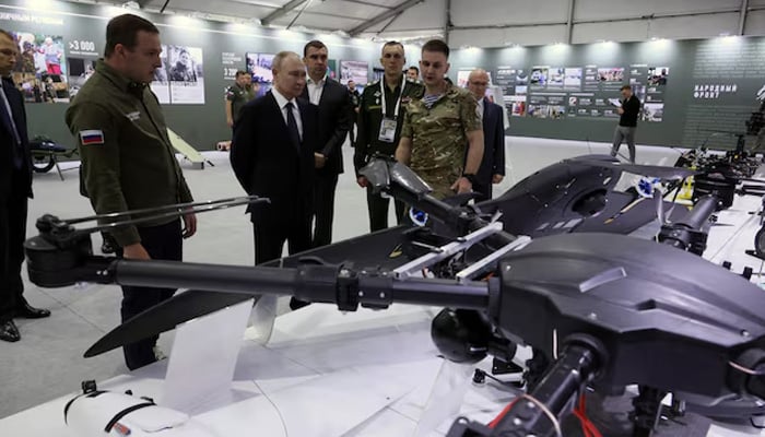 Russian President Vladimir Putin tours a military hardware exhibition organised by the All-Russia Peoples Front political movement, in Moscow, Russia July 6, 2025. — Reuters