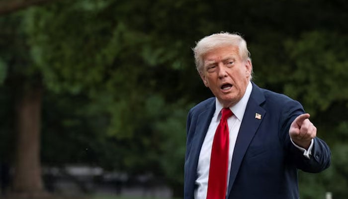 US President Donald Trump speaks to press as he arrives at the White House in Washington, DC on July 13, 2025. — Reuters