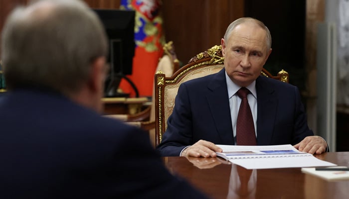 Russian President Vladimir Putin attends a meeting with President of the Russian Academy of Sciences Gennady Krasnikov, in Moscow, Russia, on July 15, 2025. — Reuters