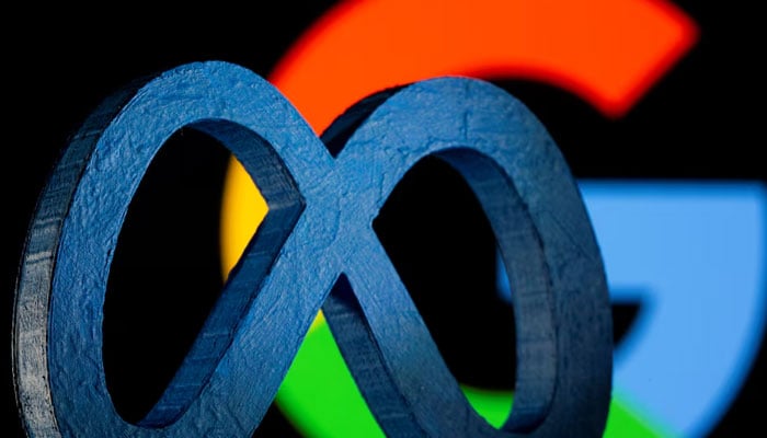 A 3D printed Facebooks new rebrand logo Meta is seen in front of displayed Google logo in this illustration. — Reuters/File