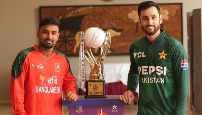 Pakistan T20I skipper Salman Ali Agha (right) and Bangladesh skipper Litton Das pictured with T20I series trophy. — Facebook/PakistanCricketBoard