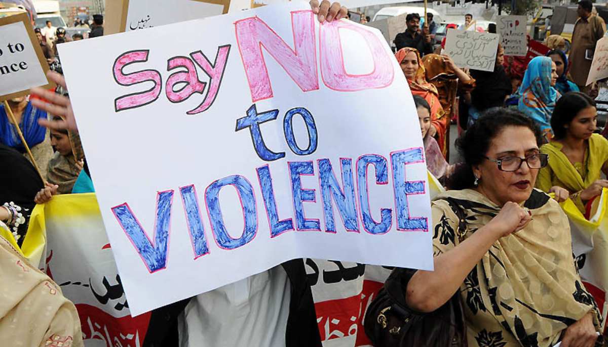 Women demonstrate on the streets to condemn violence against women. — AFP/File