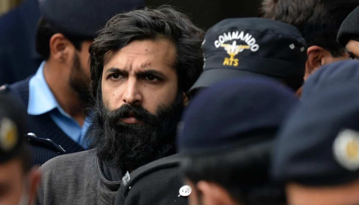 Pakistani-American Zahir Jaffer, convicted of murdering Noor Mukadam, arrives in a court before the case verdict in Islamabad on February 24, 2022. — AFP