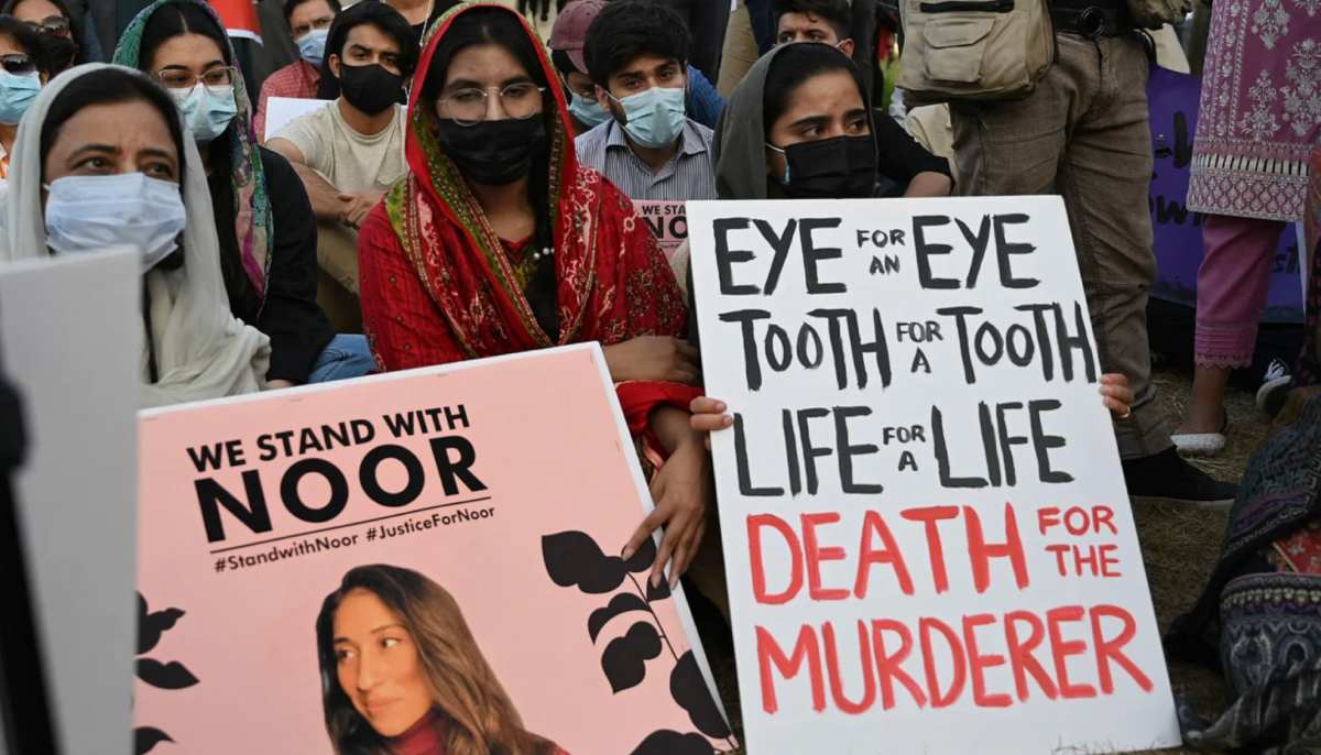 Women rights activists hold placards during a protest rally, against the brutal killing of Noor Mukadam, on September 22, 2021. — AFP