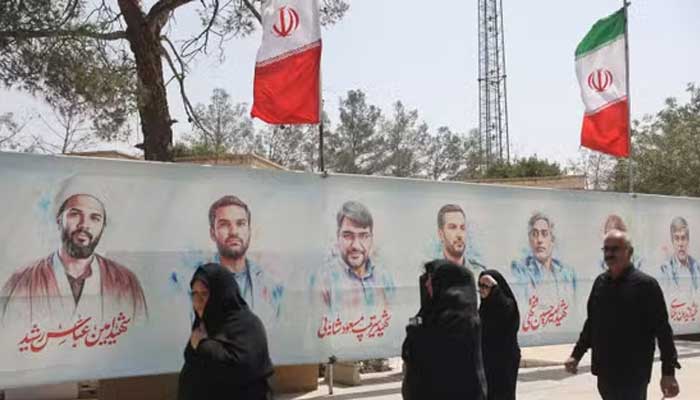 Pictures of Iranian military commanders, nuclear scientists and others killed in Israeli strikes are displayed in Behesht Zahra Cemetery in southern Tehran, Iran, July 11, 2025. — Reuters