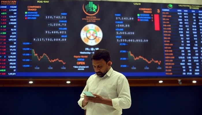 Broker is busy in trading at Pakistan Stock Exchange (PSX) in Karachi on Wednesday, June 18, 2025. — PPI