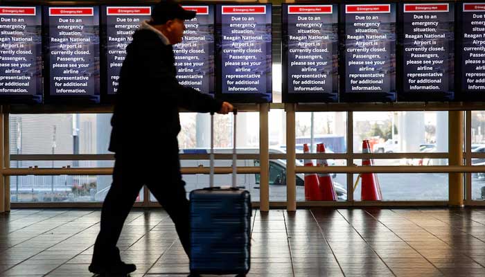 A person walks at Ronald Reagan Washington National Airport in Arlington, Virginia, U.S., January 30, 2025. — Reuters