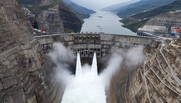 The Baihetan hydropower plant is seen in operation on the border between Qiaojia county of Yunnan province and Ningnan county of Sichuan province, China June 28, 2021. — Reuters