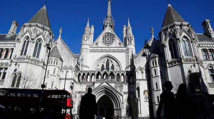 At UK court, Pakistan's ex-serviceman says he and his family faced threats over false allegations