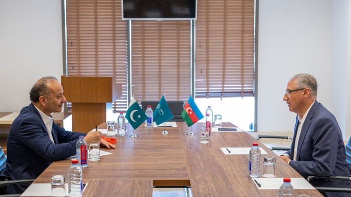 Pakistan presses for global emissions cuts, resilience funding at COP-29 summit 8 Federal Minister for Climate Change and Environmental Coordination Dr Musadik Malik (left) interacts with an Azeri official in Shamakhi, Azerbaijan. — Climate Change Ministry
