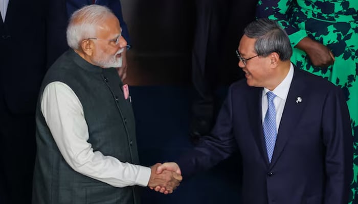 Indias Prime Minister Narendra Modi shakes hands with Chinas Premier Li Qiang during the BRICS Summit in Rio de Janeiro, Brazil on July 7, 2025. — Reuters