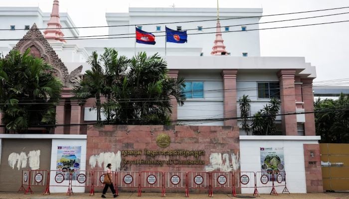 A woman walks past the Royal Embassy of Cambodia in Bangkok, Thailand, July 24, 2025. — Reuters