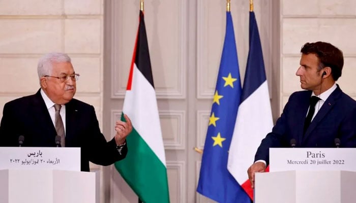 Palestinian Authority President Mahmoud Abbas (left) and French President Emmanuel Macron during talks in Paris in July 2022. — Reuters