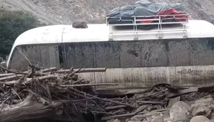 A vehicle caught in a landslide on Babusar Chilas road in this undated image. — Reporter