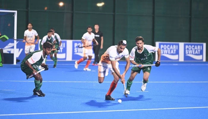 Pakistani and Indian players in action during 2024 mens Junior Hockey Asia Cup final on December 4, 2024. — Asian Hockey Federation