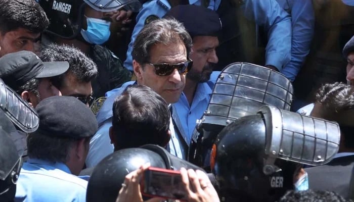 PTI founder Imran Khan arrives to appear at the Islamabad High Court on May 12, 2023. — APP