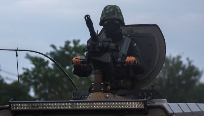 A soldier rides a military vehicle in Buriram province, after Thailand scrambled an F-16 fighter jet to bomb targets in Cambodia following artillery volleys from both sides that killed civilians, Thailand, July 25, 2025.— Reuters
