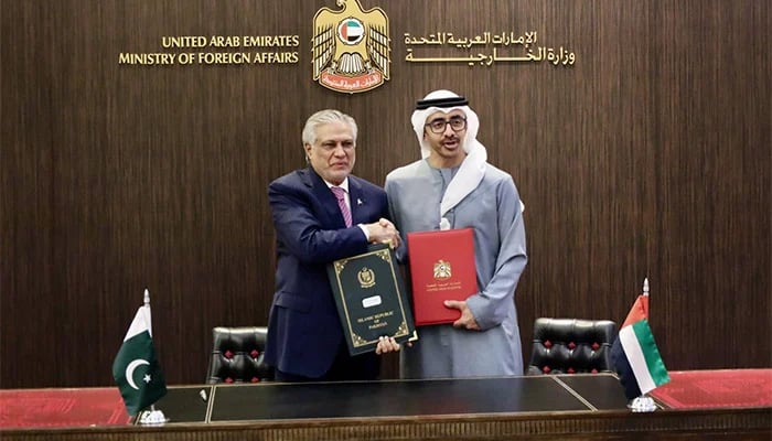 Deputy Prime Minister and Foreign Minister Senator Ishaq Dar (left) and his UAE counterpart Sheikh Abdullah bin Zayed Al Nahyan shaking hands after signing MoUs in Abu Dhabi, UAE. — X/@ForeignOfficePk/File