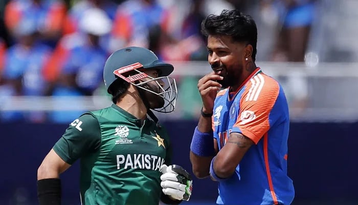 Pakistans Mohammad Rizwan (left) and Indias Hardik Pandya interact during their ICC Mens T20 World Cup 2024 match at the Nassau County International Cricket Ground in New York on June 9, 2024. — ICC