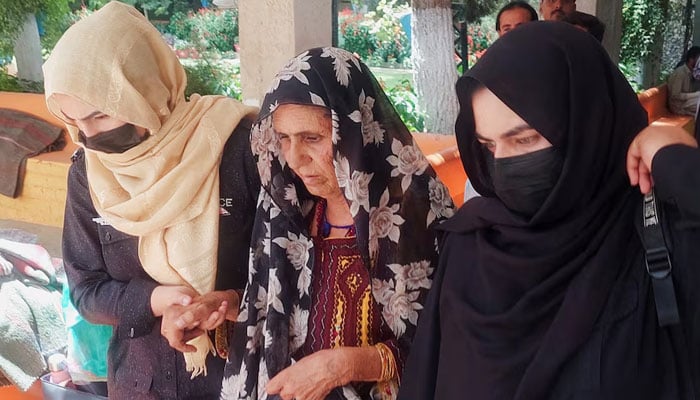 Policewomen escort Gul Jan Bibi (Centre), mother of Bano Bibi, at a local court in Quetta, July 26, 2025. — Reuters