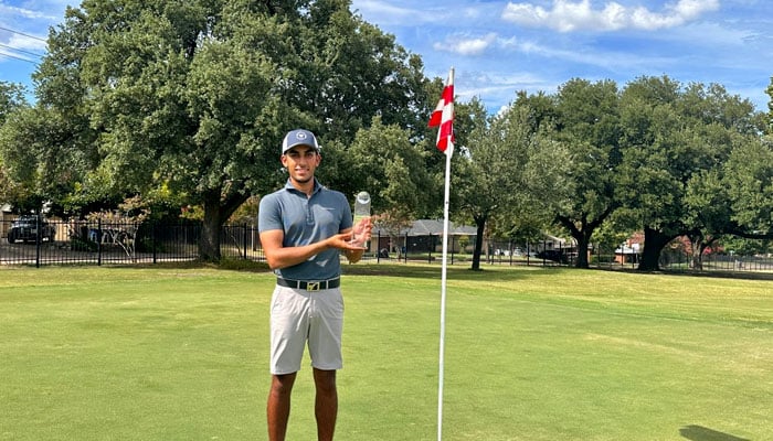 Pakistan’s National Junior Amateur Golf Champion Saad Habib Malik poses with the runner-up trophy at the Dallas Amateur Golf Championship 2025. — Reporter