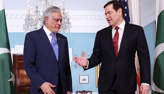 US Secretary of State Marco Rubio and Deputy Prime Minister and Foreign Minister Ishaq Dar shake hands for photographers assembled at the State Department in Washington, DC, US, July 25, 2025. — Reuters