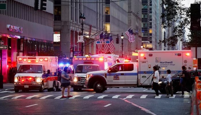 Media members walk past an emergency services vehicle near the scene of a reported shooter situation in the Manhattan borough of New York City, US July 28, 2025. — Reuters