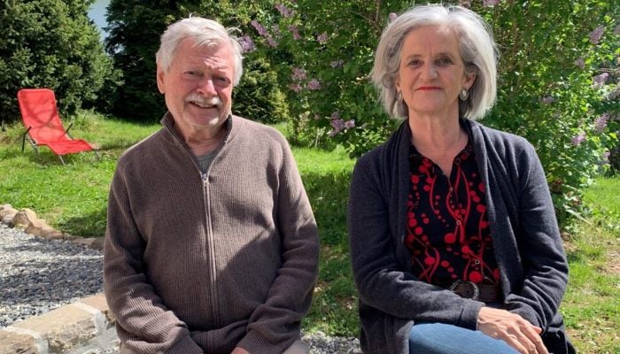 An elderly Swiss couple pose after an interview with Reuters in Vevey, Switzerland, April 11, 2024. — Reuters