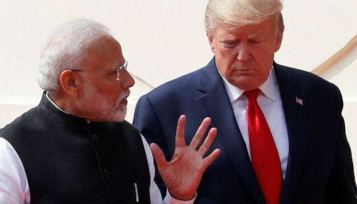 US President Donald Trump and Indias Prime Minister Narendra Modi talk as they arrive for a joint news conference after bilateral talks at Hyderabad House in New Delhi, India, February 25, 2020. — Reuters