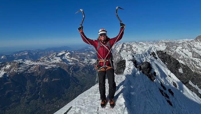German double Olympic biathlon champion Laura Dahlmeier poses at the top of a mountain in this undated image. — Instagram/@laura_dahlmeier